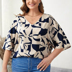 Blusa Feminina Plus Size Meia Manga Abstrata